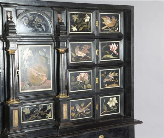 A 17th/18th century Italian and later pietra dura and ebony veneered cabinet on an ebonised wood stand, W.4ft 2in. D.1ft 7in. H.4ft 6.5